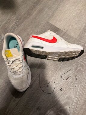 Nike White Sneakers with Red Swoosh and Teal Lining